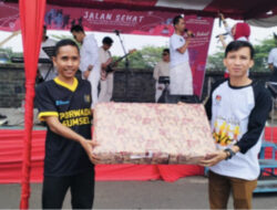 Sekretaris PWI OKI Raih Hadiah Utama Jalan Sehat KPU